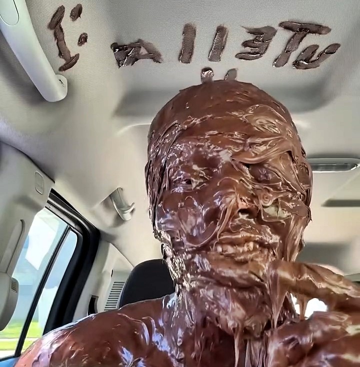 Man covers himself in chocolate frosting in viral Nutella-themed video, leaving viewers shocked and some swearing off the popular spread for life. The clip has 1 million views.