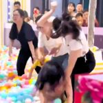 Two mums brawled WWE-style in a kids' ball pit in China, shocking onlookers as horrified parents and children watched. The chaotic scene quickly became an online sensation.