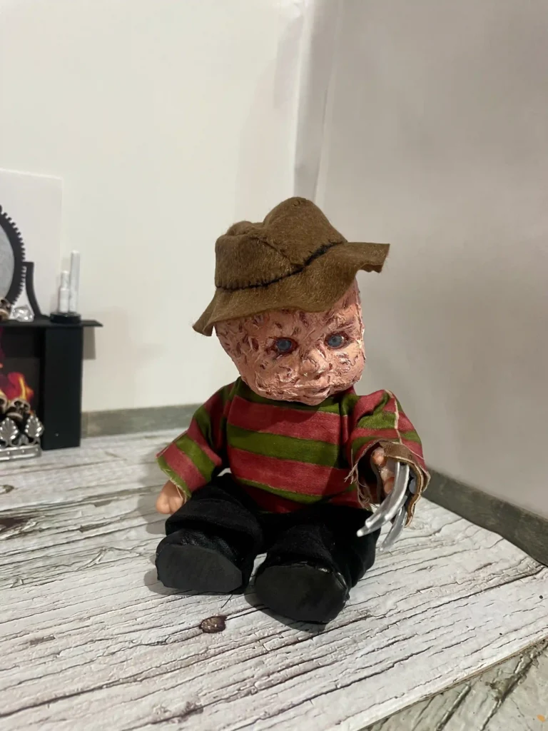 Halloween superfan transforms budget dolls into mini horror icons, from Michael Myers to Pennywise. Her handmade collection has fans begging for their own spooky doll!