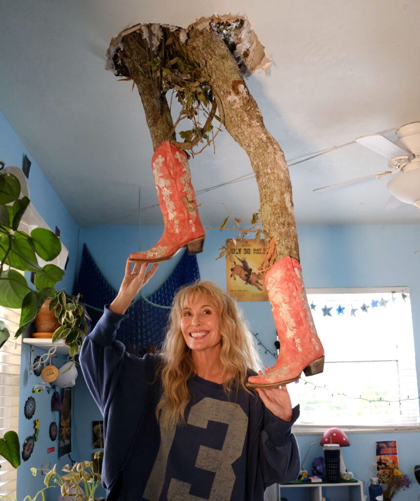 After Hurricane Milton damaged her home, Lorraine C Ladish went viral for decorating a tree branch that crashed through her roof, finding humor and positivity in a tough situation.