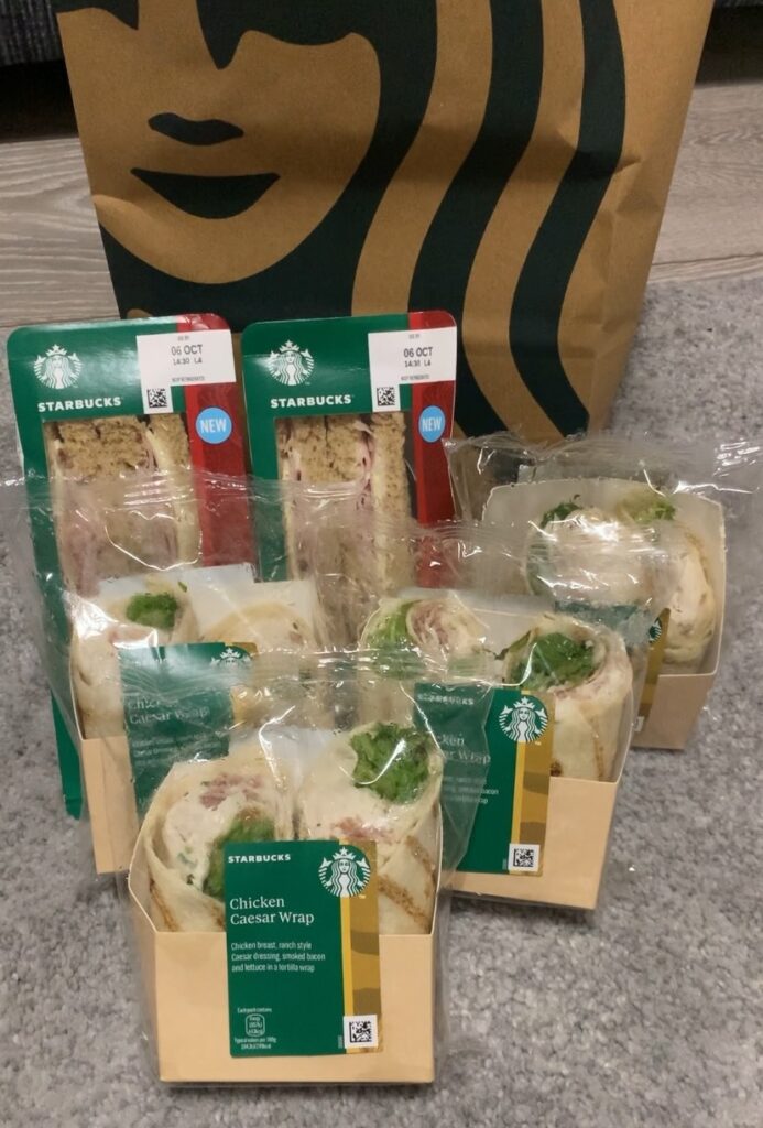 NHS worker Tiegan orders her first Too Good to Go bag from Starbucks, only to be surprised with an unexpected haul of identical chicken Caesar wraps – sparking laughter online!