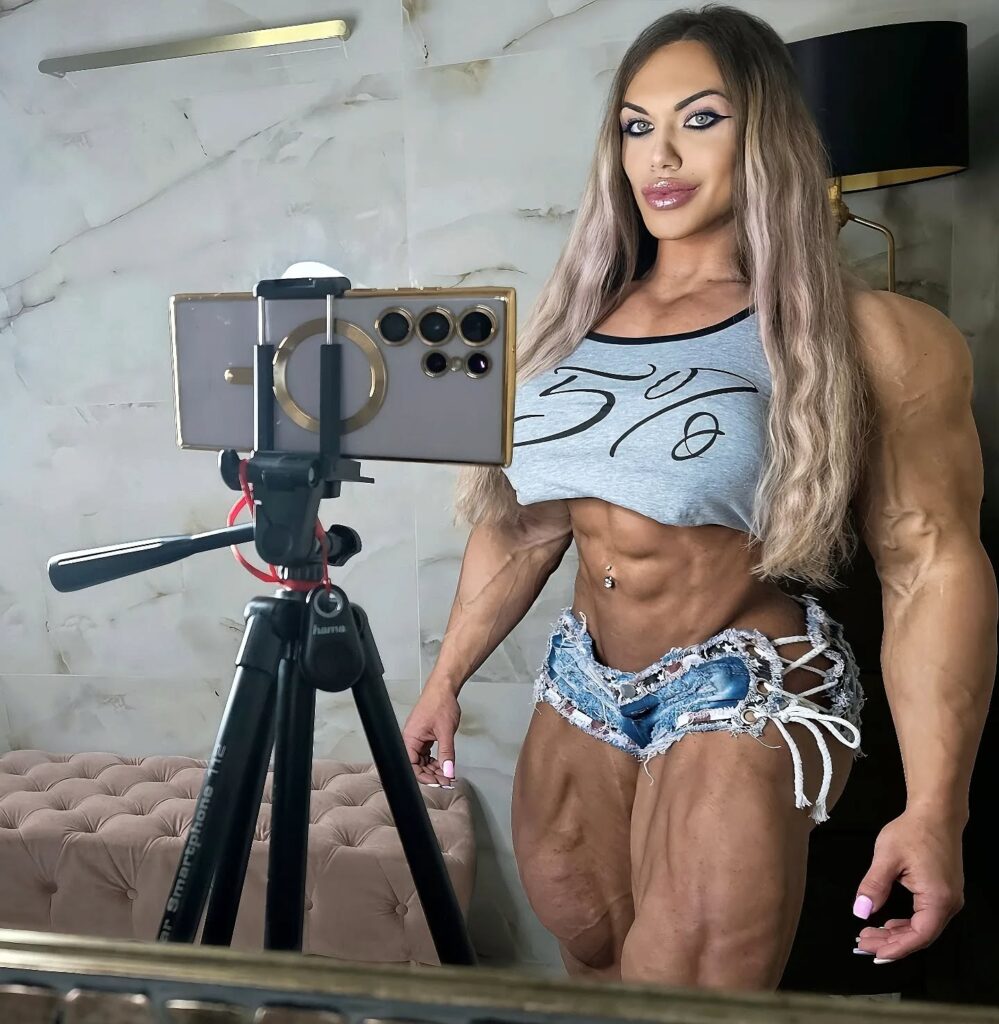 A powerlifter, dubbed an Amazon warrior, stuns with incredible physique and workout videos. With 1.2M Instagram fans, she handles admirers and trolls with confidence.