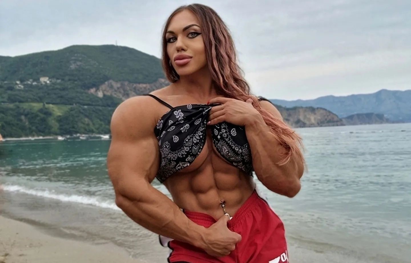 A powerlifter, dubbed an Amazon warrior, stuns with incredible physique and workout videos. With 1.2M Instagram fans, she handles admirers and trolls with confidence.