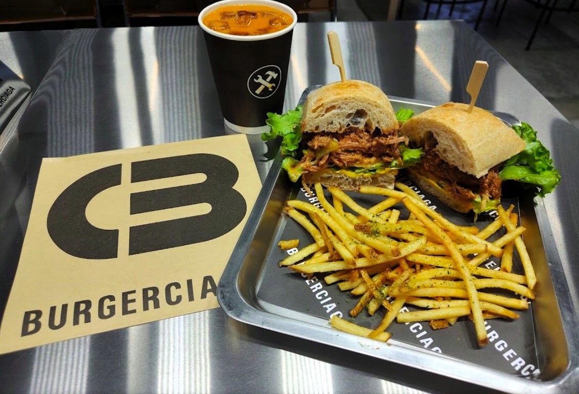 Burgerciaga, a Balenciaga-inspired burger joint in Taipei, wows diners with chic design and affordable prices, offering gourmet burgers under £15 in a luxury setting.