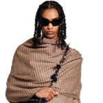 Balenciaga faces backlash for selling a £1,890 skirt nearly identical to its £625 scarf, sparking outrage over the price hike in its new Spring 25 Collection.