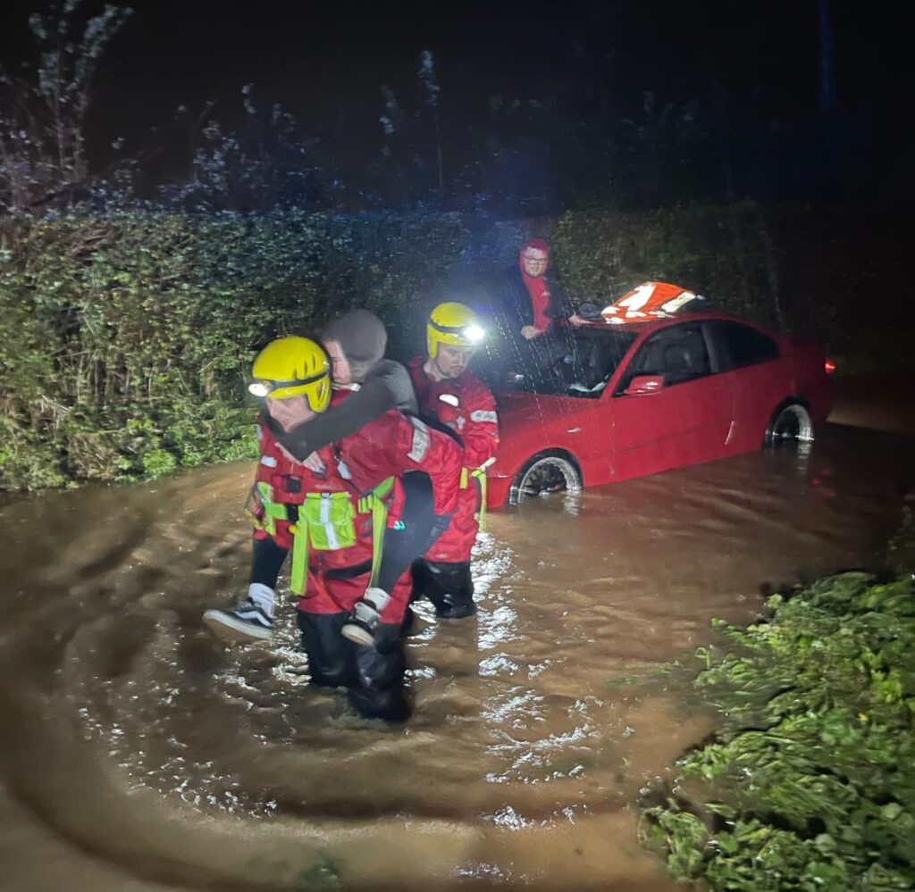 A couple's romantic night turned dramatic during Storm Bert as their car flooded. Stranded on the roof, Davie proposed to Ashley, making it a truly unforgettable moment!