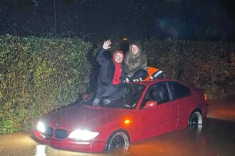 A couple's romantic night turned dramatic during Storm Bert as their car flooded. Stranded on the roof, Davie proposed to Ashley, making it a truly unforgettable moment!