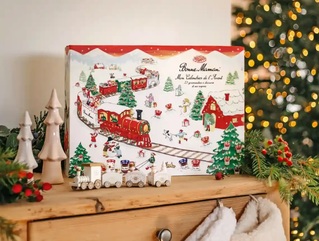 Bonne Maman's jam-packed advent calendar, featuring 23 unique mini conserves and a festive surprise behind door 24. Perfect for sweetening up December!