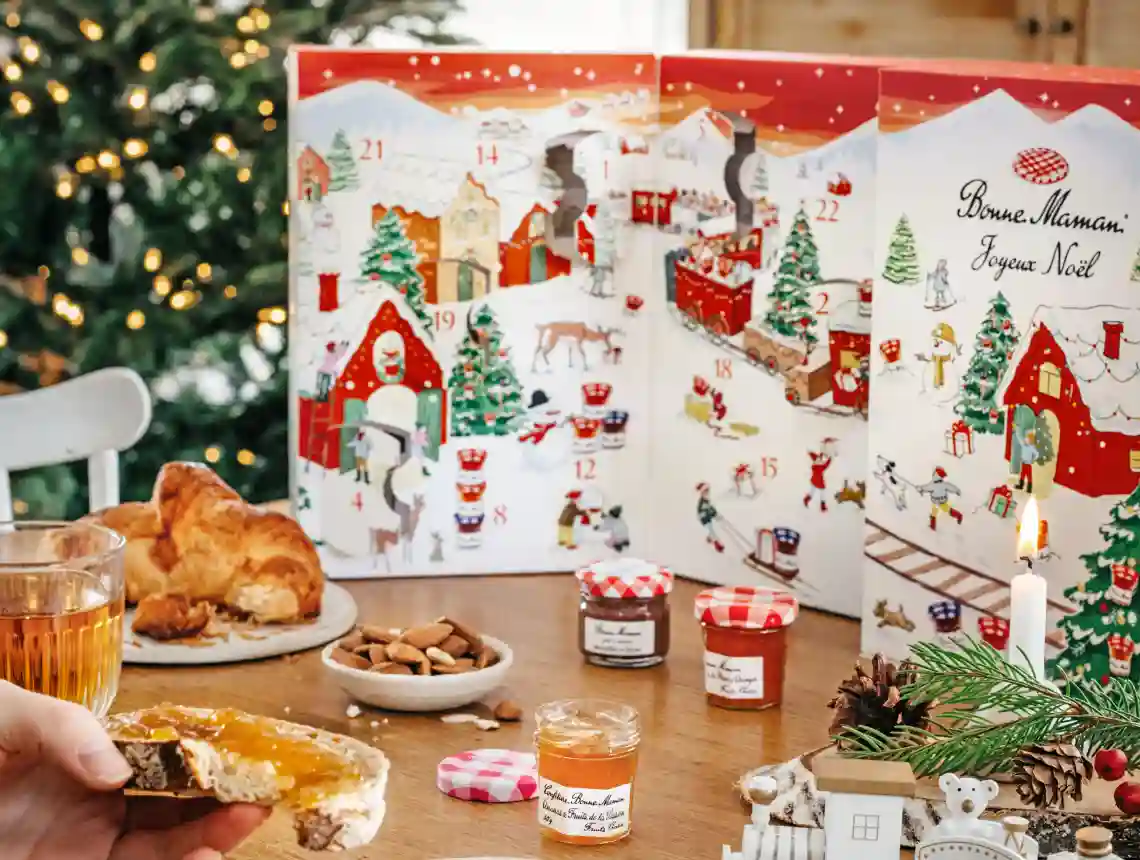 Bonne Maman's jam-packed advent calendar, featuring 23 unique mini conserves and a festive surprise behind door 24. Perfect for sweetening up December!