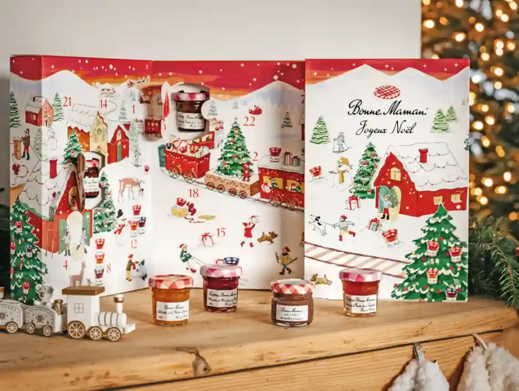 Bonne Maman's jam-packed advent calendar, featuring 23 unique mini conserves and a festive surprise behind door 24. Perfect for sweetening up December!