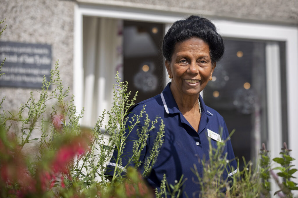 Britain's oldest nurse, 84-year-old Daisy Richards, wins gold at Wales Care Awards for Dignity in Care, celebrating 66 years of dedication at Fairways Newydd Care Home.