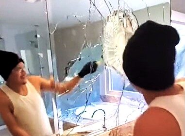 Builders smash luxury bathroom after client allegedly fails to pay $10,000 labor fee. Viral TikTok video sparks debate on handling payment disputes. 920,000+ views.