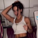 Fitness influencer Barbara defies trolls with another mid-flight workout, prioritizing health on a 45-hour journey to Bangkok despite online backlash for her routines.