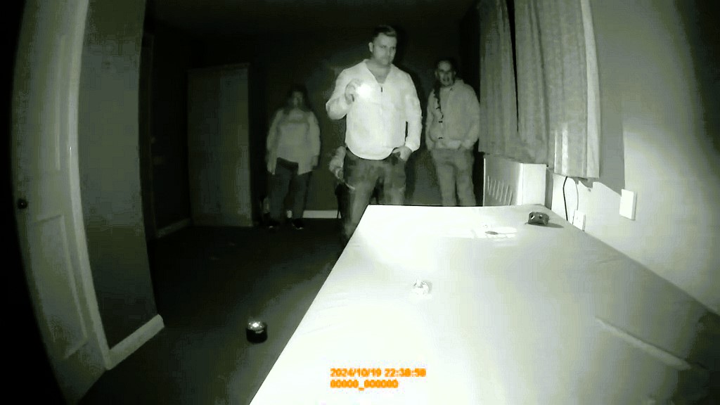 Paranormal investigators stunned as a cat toy mysteriously moves at a haunted care home, capturing eerie voices and unexplained activity during the spine-chilling night.