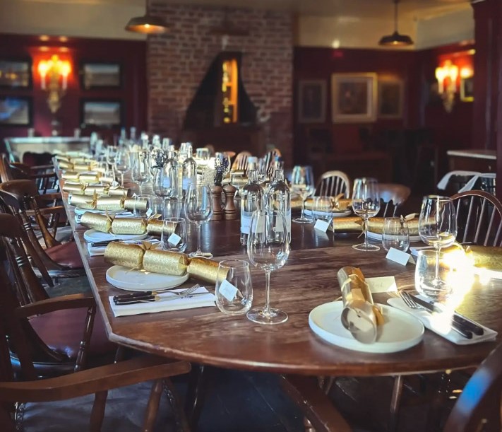 Guy Ritchie's pub charges up to £2,000 for Christmas dinner—without turkey! Guests can book a private room with a pricey minimum spend, sparking mixed reactions.