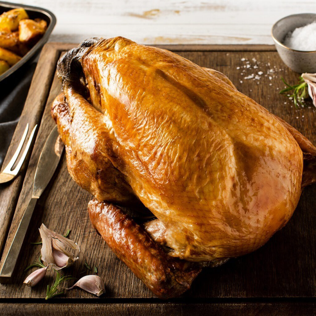 UK Christmas turkeys soar in price, with premium butcher offering a £275 herb-fed bird. High-end supermarkets follow suit, marking a pricey festive season amid inflation.