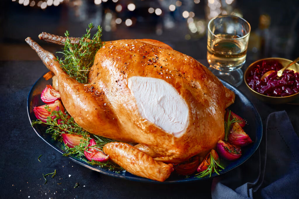 UK Christmas turkeys soar in price, with premium butcher offering a £275 herb-fed bird. High-end supermarkets follow suit, marking a pricey festive season amid inflation.