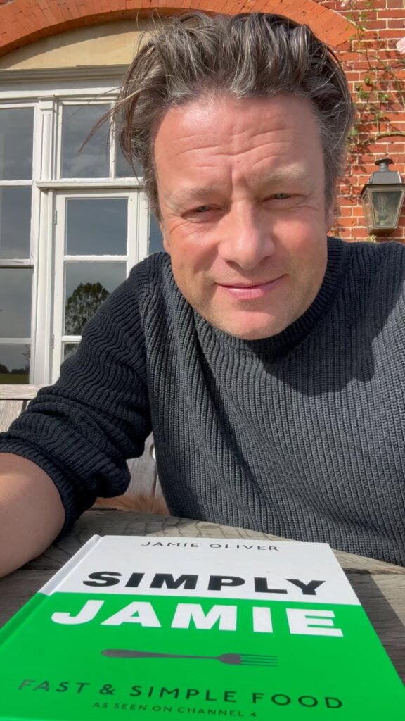 Jamie Oliver’s £99 Christmas hamper sparks debate with quirky items like pepper powder, chickpeas, and a wooden spoon, despite selling out instantly.