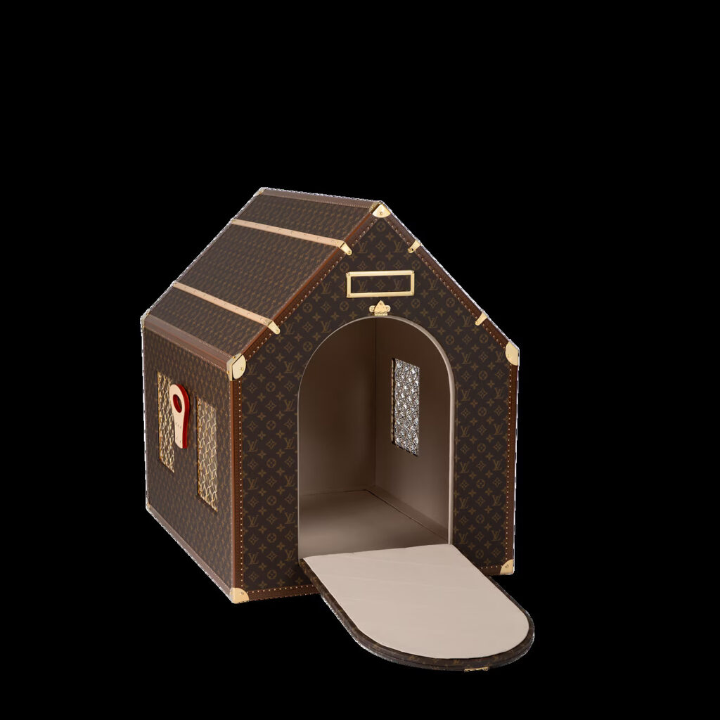 Louis Vuitton's £52,500 dog kennel, part of Pharrell’s urban dog-walking collection, sparks online ridicule, with users mocking its luxury features for pets.