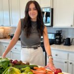 Busy mum saves $120 weekly by prepping 20 nutritious family meals, storing them in the freezer for easy slow-cooker dinners, and bonding with her kids over meal prep.