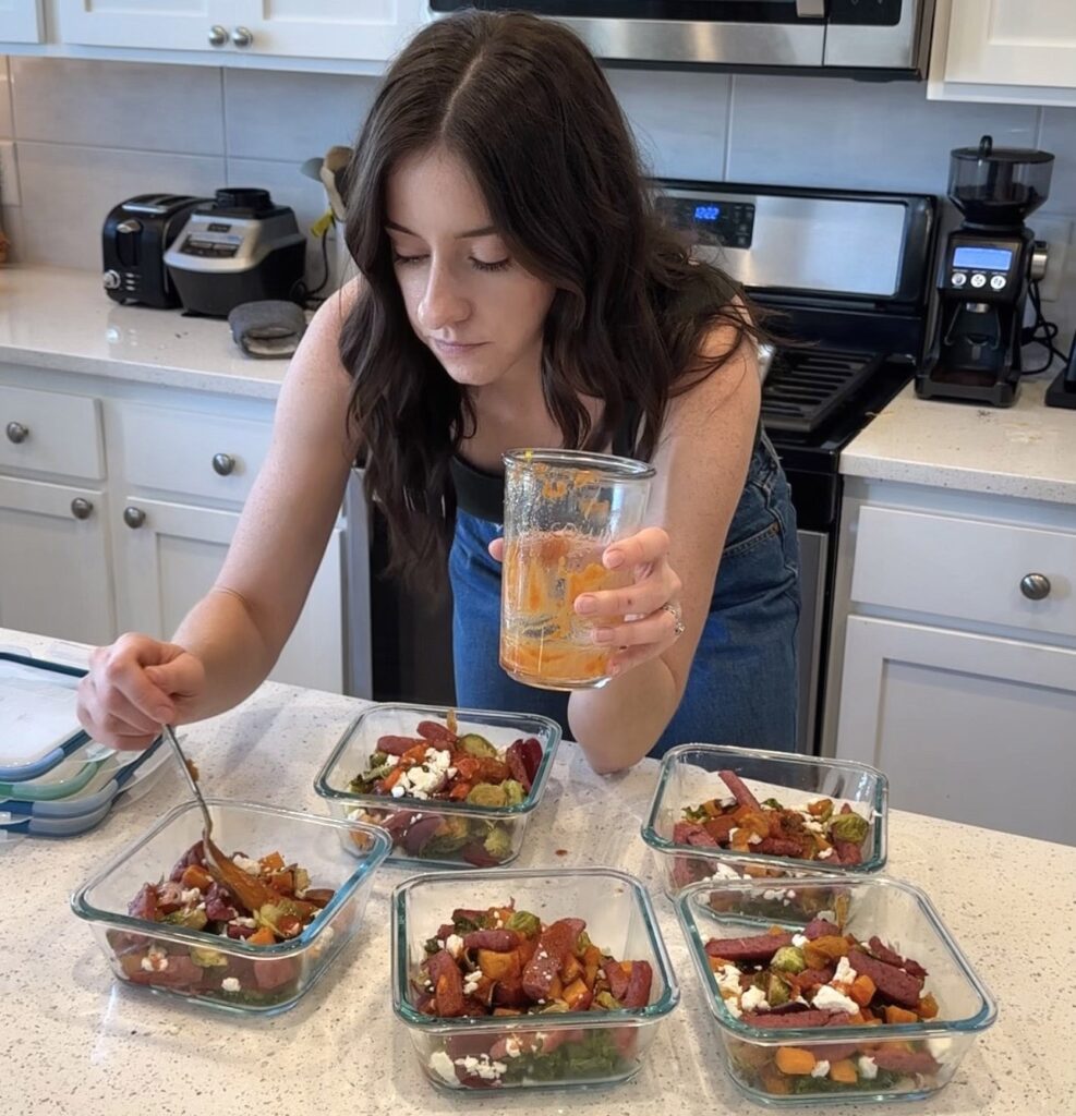 Busy mum saves $120 weekly by prepping 20 nutritious family meals, storing them in the freezer for easy slow-cooker dinners, and bonding with her kids over meal prep.