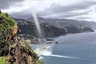 Gigantic waterspout captured near Madeira stuns viewers; the rare weather phenomenon dissipates near land, showcasing nature's awe-inspiring yet dangerous power.