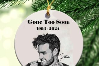 Fans honor late One Direction star Liam Payne with memorial Christmas baubles, featuring angel wings and heartfelt tributes, as they remember the singer this holiday season.