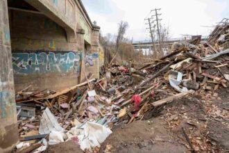 A videographer captures the devastating aftermath of Hurricane Helene in Florida, two months on. Homes destroyed, debris piled high, and messages of resilience remain.