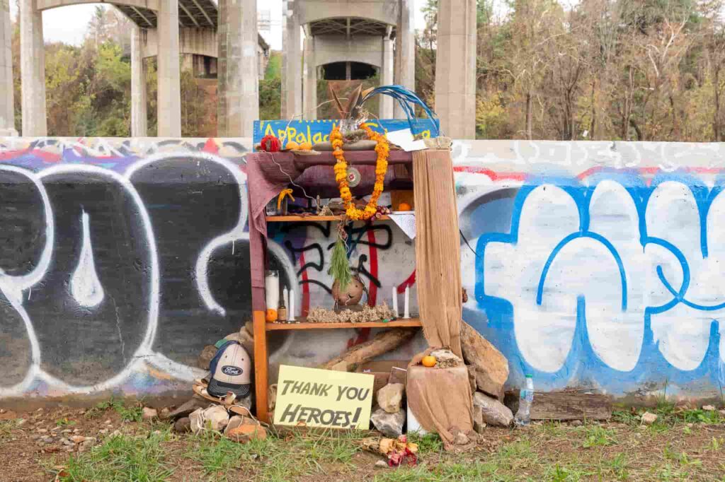 A videographer captures the devastating aftermath of Hurricane Helene in Florida, two months on. Homes destroyed, debris piled high, and messages of resilience remain.