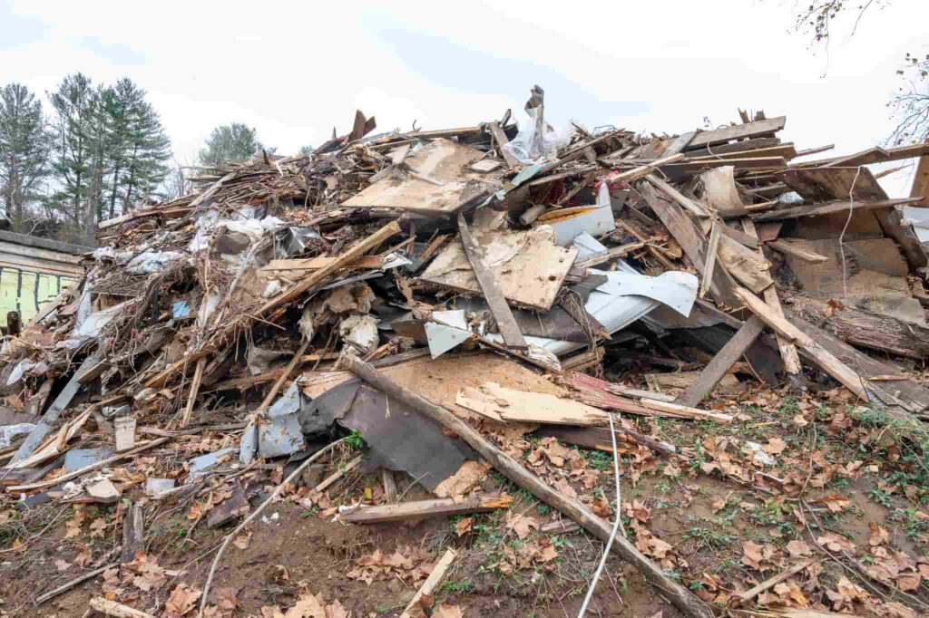 A videographer captures the devastating aftermath of Hurricane Helene in Florida, two months on. Homes destroyed, debris piled high, and messages of resilience remain.