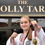 Teen Wetherspoons waitress and 4th dan black belt, Ella Heyes, balances work, A Levels, and taekwondo, earning gold at the British Championships and bronze in Europe.