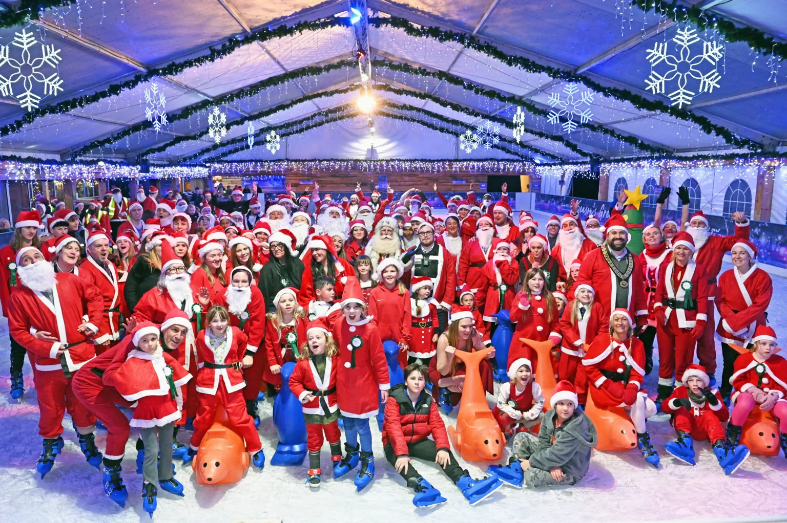 157 Santas skate into history at Clarks Village, Somerset, breaking the world record for most Santas on ice. Festive fun launches the countdown to Christmas!