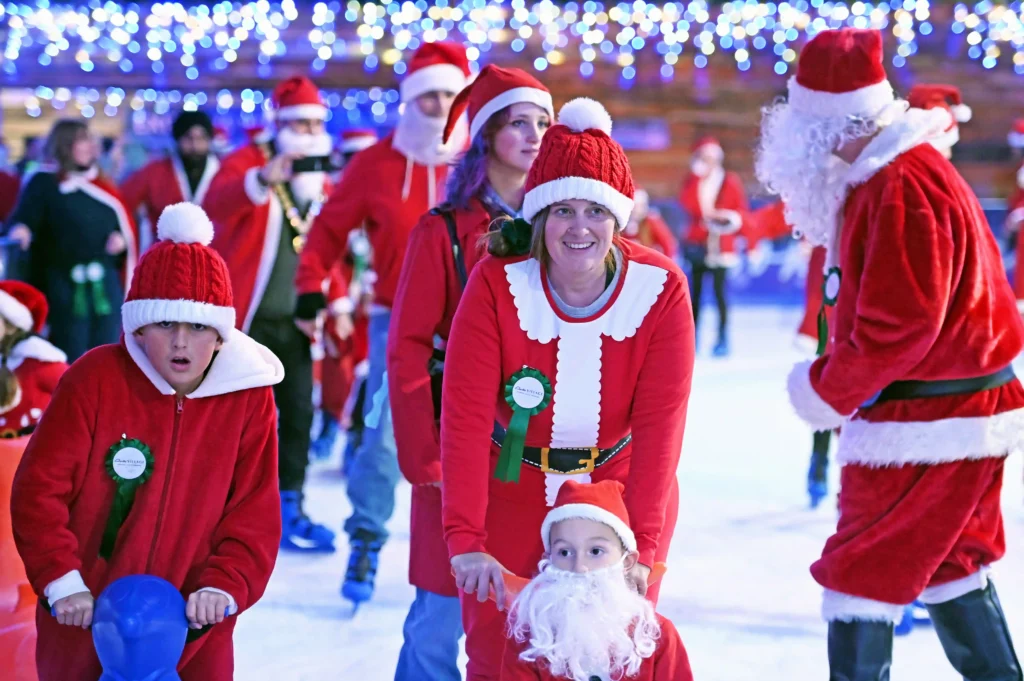 157 Santas skate into history at Clarks Village, Somerset, breaking the world record for most Santas on ice. Festive fun launches the countdown to Christmas!