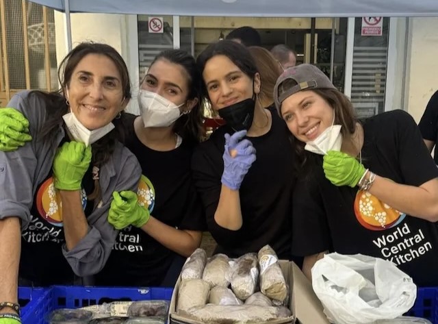 Pop star Rosalia volunteers with World Central Kitchen to aid flood victims in Valencia, Spain, helping distribute food amid devastating flash floods.