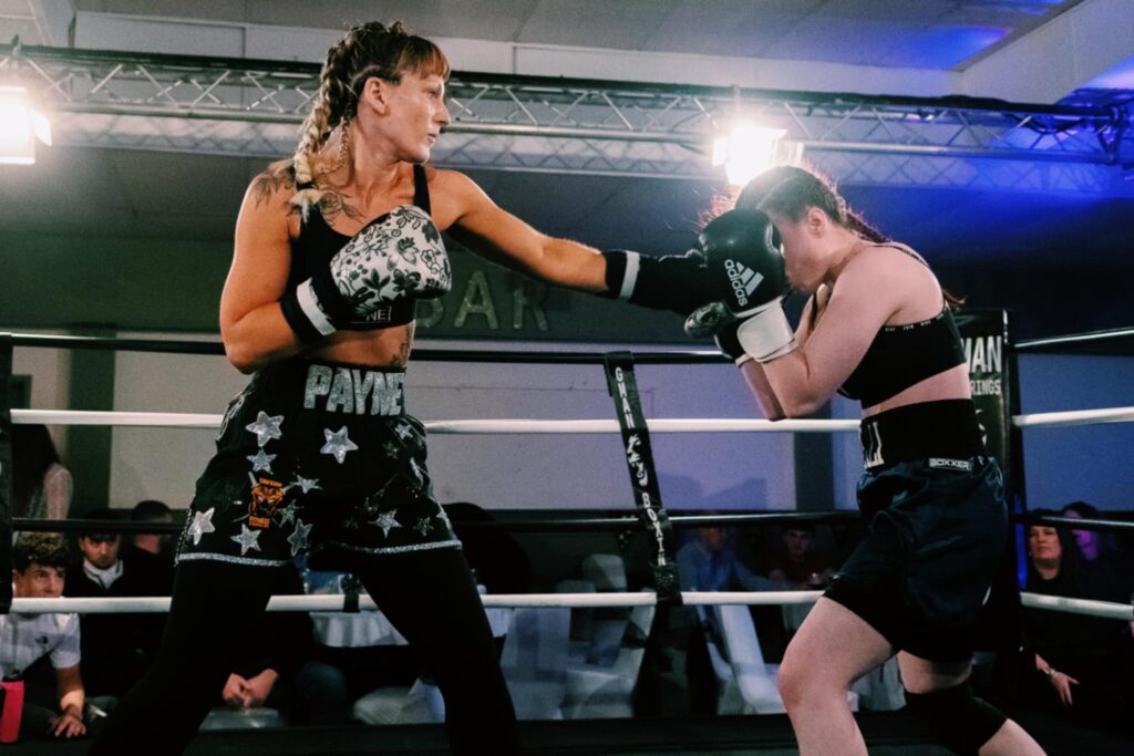 Single mum Lucy Payne finds new purpose in boxing, overcoming dark times to become a UBF champion; the sport transformed her life and brought her closer to her sons.