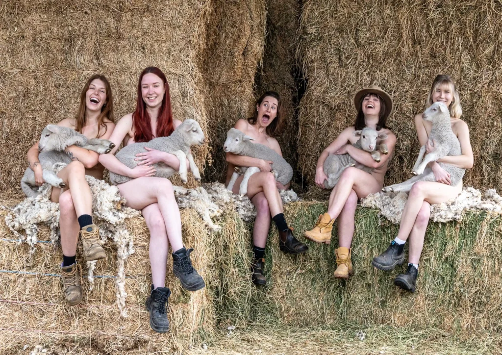 University students bare all for the 2025 "Flash for Farmers" calendar, raising funds for Rural Aid with creative nude shots featuring tractors, animals, and farm scenes.