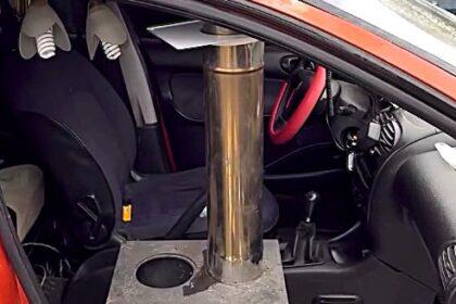 Woman installs mini furnace in her car to stay cozy this winter, viral video garners 55M views as followers praise her inventive heating solution.