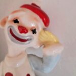 A haunted ceramic clown named Craig, bought at a car boot sale, allegedly brought storms, ravens, and eerie vibes—now sold despite spooky warnings!