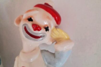 A haunted ceramic clown named Craig, bought at a car boot sale, allegedly brought storms, ravens, and eerie vibes—now sold despite spooky warnings!