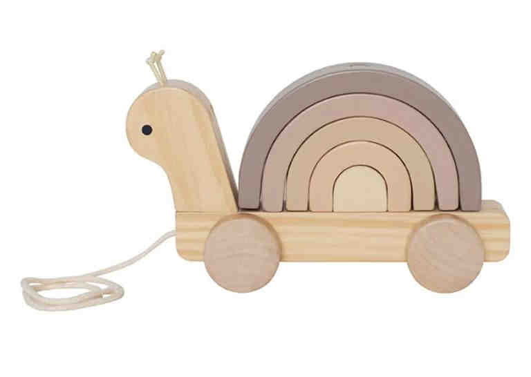 Muted rainbow toy sparks online backlash: Millennial aesthetic blamed for 'plainbow' with beige, taupe, and grey hues, leaving parents questioning its visual appeal.