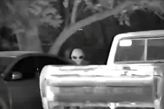 Viral footage shows an 'alien' near cars in Mexico, sparking UFO debates. Expert Jaime Maussan highlights the clip as key evidence of extraterrestrial life.