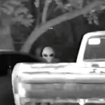 Viral footage shows an 'alien' near cars in Mexico, sparking UFO debates. Expert Jaime Maussan highlights the clip as key evidence of extraterrestrial life.