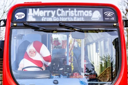 Bus driver Julie Richardson spreads holiday cheer with festive costumes, donning a new outfit daily in December to bring joy during a challenging time of year.