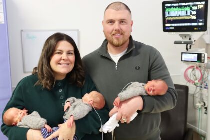 A couple defied odds of up to 200 million-to-one by having natural identical triplets. Now home after weeks in NICU, the boys join their siblings for a magical Christmas.