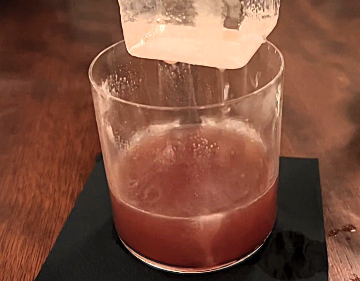 A Dublin couple was outraged after paying £12.60 for a cocktail with a giant ice cube and minimal liquid at Hawksmoor. The restaurant defends the premium for quality and experience.