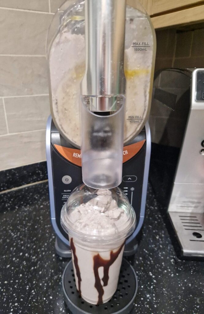 Woman spots Ed Sheeran's face in her milkshake maker, leaving friends in stitches. The uncanny resemblance to his album cover has fans crying, "Let Ed out!"