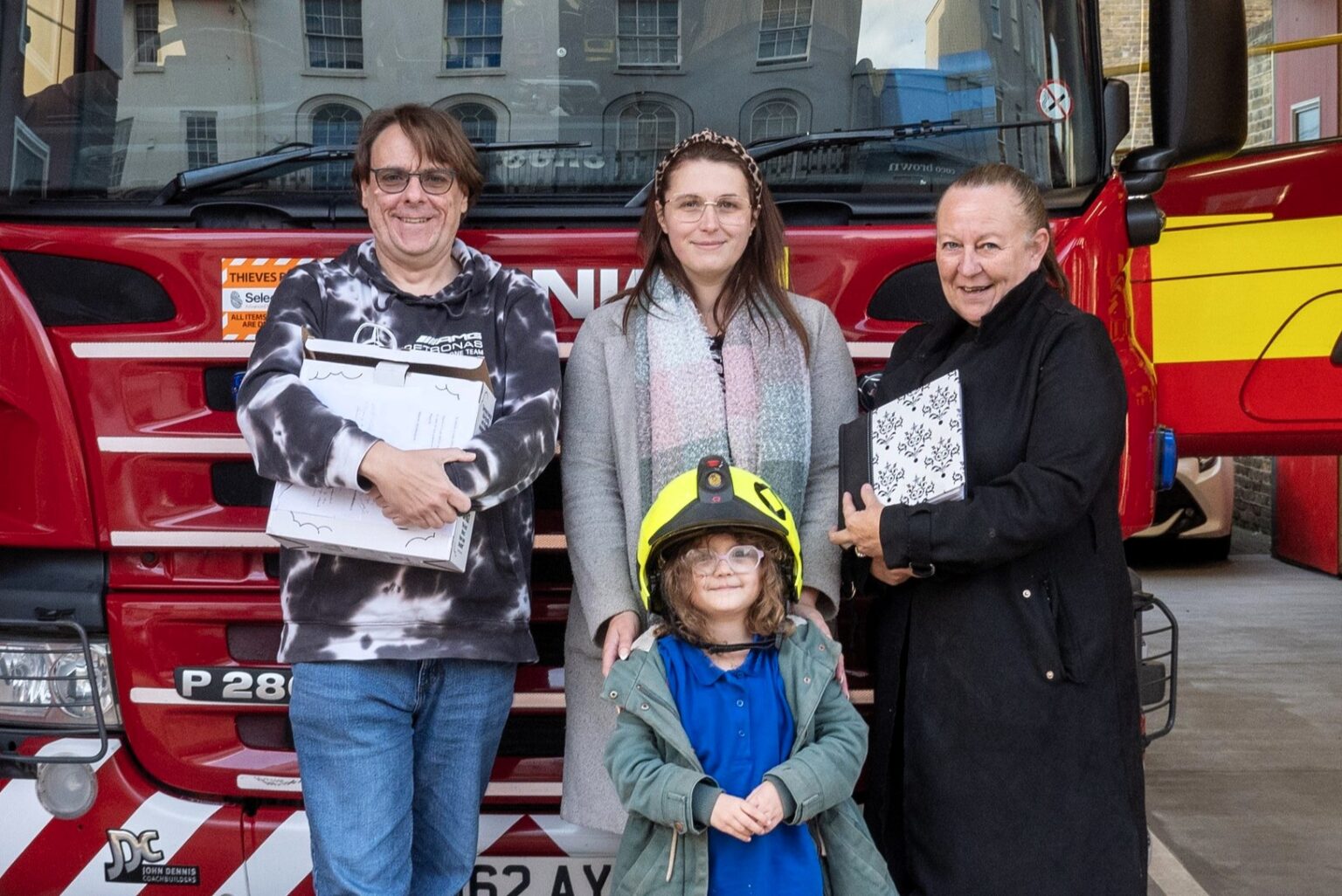 A family was reunited with a WWII firefighter’s photo album, saved from a car set for scrap. The album reveals Albert Scrivens’ dual roles as a heroic fireman and photographer.