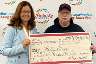 Man wins £393,885 after playing the same lottery numbers for nine years but misses the jackpot by one digit. The Kentucky winner plans to pay off debts and reset his life.