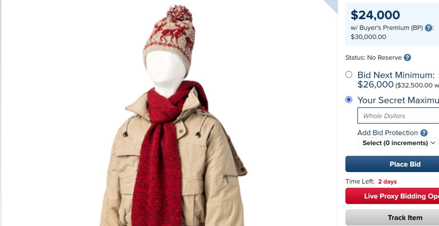 Kevin McCallister’s iconic outfit from *Home Alone*, including his beige coat and festive hat, is up for auction. Current bid: $24,000. A must-have for Christmas fans!