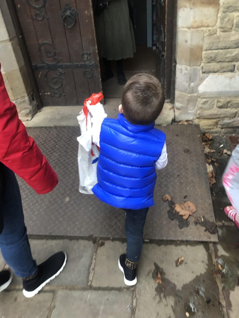 Seven-year-old Rowan melts hearts by using his savings to buy Christmas gifts for less fortunate kids, spreading joy with over 90 presents delivered so far.